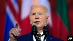 El presidente Joe Biden pronuncia un discurso con motivo del 75.º aniversario de la OTAN en el Auditorio Andrew W. Mellon, el martes 9 de julio de 2024, en Washington. 