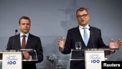 Finnish Minister of Finance and National Coalition chairman Petteri Orpo (L) and Finnish Prime Minister and Centre Party chairman Juha Sipila attend a news conference at the PM's official residence Kesaranta in Helsinki, Finland, June 12, 2017. 