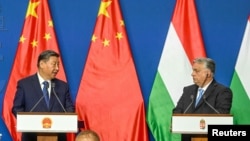 匈牙利总理欧尔班和中国国家主席习近平2024年5月9日在匈牙利布达佩斯举行联合记者会。