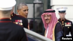 U.S. President Barack Obama (L) greets Saudi Arabia's Crown Prince Mohammed bin Nayef as he plays host to leaders and delegations from the Gulf Cooperation Council countries at the White House in Washington, May 13, 2015.