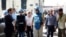 A team of United Nations observers tours the Syrian town of al-Haffe with an official Syrian security escort, June 14, 2012. 