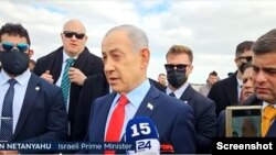 Netanyahu speaks to reporters