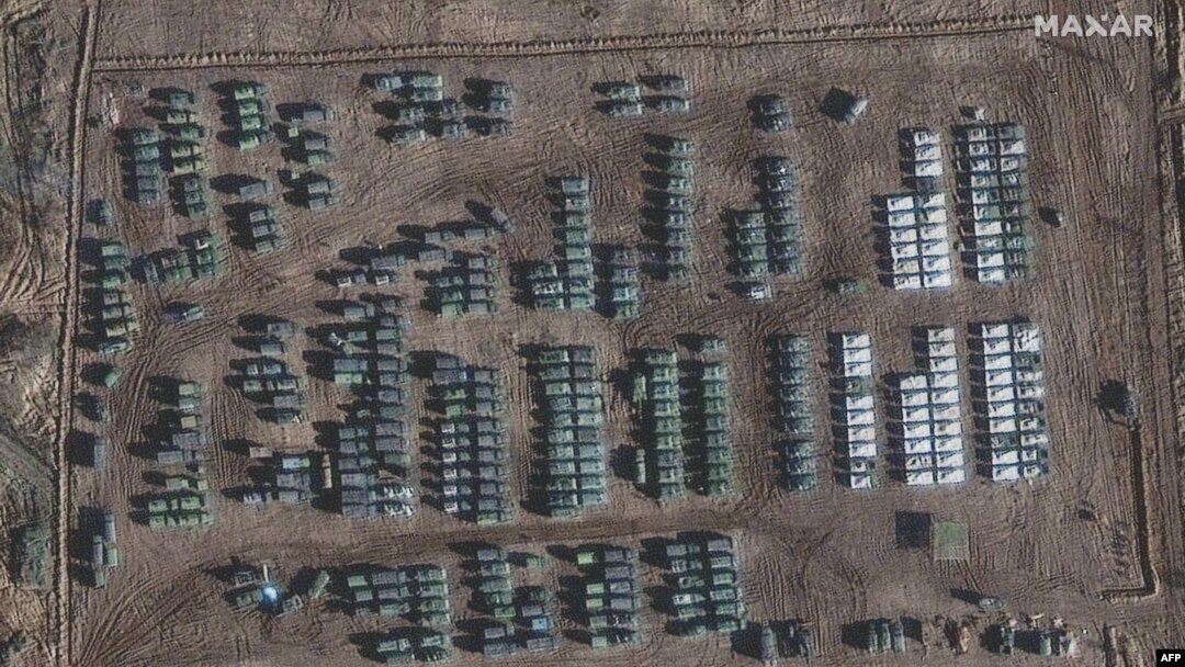 This handout satellite image released by Maxar Technologies and taken on November 1, 2021, shows the presence of a large ground forces deployment on the northern edge of the town of Yelnya, Smolensk Oblast, Russia. 
