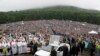 Pope Braves Rain-soaked Mountain Roads for Transylvania Mass 