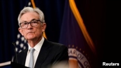 Federal Reserve Chair Powell announces interest rate hike during news conference in Washington