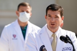 Dr. Sean Conley, physician to President Donald Trump, briefs reporters at Walter Reed National Military Medical Center in Bethesda, Md., Oct. 4, 2020.