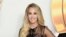 FILE - Carrie Underwood attends the 2018 Radio Disney Music Awards in Los Angeles, June 22, 2018.