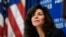 Ashley Tabaddor, a federal immigration judge in Los Angeles who serves as the president of the National Association of Immigration Judges, listens as she is introduced to speak at the National Press Club​ in Washington, Sept. 21, 2018, on the pressures on judges and the federal immigration court system.