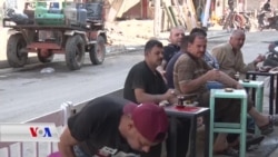 کاردانەوەی خەڵکی موسڵ لە بەرامبەر کوژرانی ئەبو بەکر ئەلبەغدادی ڕێبەری داعش