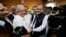 Mamnoon Hussain, center right, a candidate from ruling party Pakistan Muslim League-N shakes hands with Raza Rabbani, a candidate from opposition party Pakistan People Party in Islamabad, July 24, 2013. 