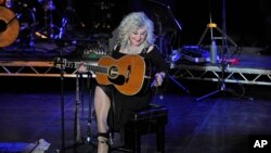 FILE - Stella Parton performs at The Beck Theatre in London, March 8, 2016.