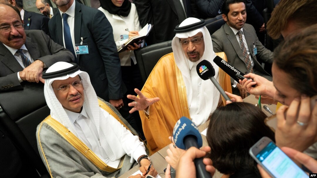 FILE - In this photo taken July 01, 2019, Saudi Arabia's Energy Minister Khaled al-Falih (R) and Saudi Deputy Oil Minister Prince Abdulaziz bin Salman bin Abdulaziz talk to the press on the sidelines of an oil meeting in Vienna, Austria.