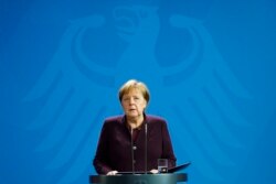 Kanselir Jerman Angela Merkel menyampaikan pernyataan terkait penembakan di pusat kota Hanau, Jerman, 20 Februari 2020.