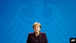 German Chancellor Angela Merkel gives a statement following a shooting in the central German city Hanau, at the chancellery in Berlin, Germany, Feb. 20, 2020.