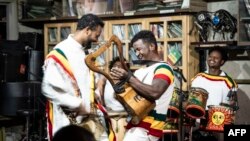 FILE - Members of Ethiocolor band play traditional music at Fendika Cultural Center in Addis Ababa, Ethiopia, on June 23, 2023.