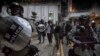 Police arrest a protester in the Wanchai area of Hong Kong, Oct. 1, 2019.