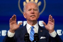 President-elect Joe Biden speaks about the COVID-19 pandemic during an event at The Queen theater, Jan. 14, 2021, in Wilmington, Del.