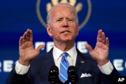 President-elect Joe Biden speaks about the COVID-19 pandemic during an event at The Queen theater, Jan. 14, 2021, in Wilmington, Del.
