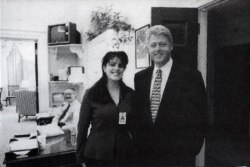 FILE - Official White House photo from the Independent Counsel Kenneth Starr's report on President Clinton, showing the president and Monica Lewinsky at the White House, Nov. 17, 1995.
