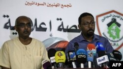 Spokesmen for the protest movement speak to the press in the Sudanese capital Khartoum, April 27, 2019. 