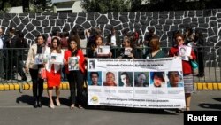 Relatives of missing people hold a protest, outside Los Pinos presidential residence, for the strengthening of the new general law on disappearance, in Mexico City, Mexico Nov. 16, 2017.