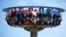 Pakistani youngsters taking a ride at an amusement park in Rawalpindi