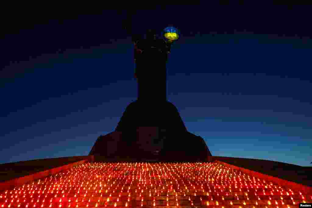 1,000 candles are seen successful  beforehand   of the &#39;Motherland&#39; monument during a commemorative ceremonial  connected  the 1,000th time  of Russia&#39;s afloat  standard  onslaught  connected  Ukraine, successful  Kyiv, Ukraine.