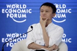 Chairman and chief executive of Alibaba Group Jack Ma reacts during a session of "Future-Proofing the Internet Economy" at the World Economic Forum (WEF) in China's port city Dalian, September 9, 2015.