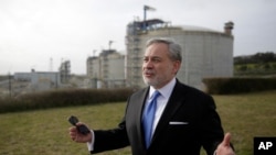 United States Secretary of Energy Dan Brouillette gestures during an interview at the LNG terminal of the deepwater port of Sines after visiting the port, in Sines, southern Portugal, Feb. 12, 2020.