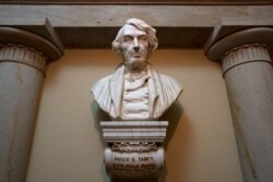 FILE - A marble bust of Chief Justice Roger Taney is displayed in the Old Supreme Court Chamber in the U.S. Capitol in Washington, March 9, 2020.