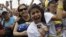 Supporters of opposition Presidential Candidate Henrique Capriles cheer during a campaign rally in Caracas, Venezuela, September 30, 2012.