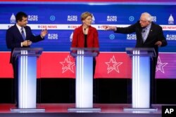 From left, Democratic presidential candidates, former Mayor Pete Buttigieg, Sen. Elizabeth Warren, D-Mass., and Sen. Bernie Sanders, I-Vt., participate in a Democratic presidential primary debate, Feb. 25, 2020, in Charleston, S.C.