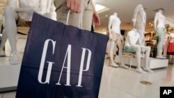 FILE -- A customer shops at a Gap store in Palo Alto, Calif.