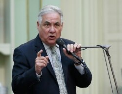 FILE - Assemblyman Jim Patterson, R-Fresno, speaks to lawmakers during the Assembly session in Sacramento, Calif., Sept. 11, 2019.