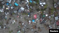 A general view shows destruction after Cyclone Idai in Beira, Mozambique, March 16-17, 2019 in this still image taken from a social media video on March 19, 2019. (Care International/Josh Estey) 