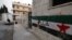 A wall with the Syrian revolutionary flag and Arabic writing which reads "freedom," northern Syria, June 3, 2012.