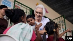 This handout picture taken on August 24, 2024 by Marina Calderon and released by the United Nations High Commissioner for Refugees shows Sister Rosita Milesi in Brazil. She is the Global Laureate of the 2024 UNHCR Nansen Refugee Award.