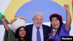 Sonia Guajajara, Brazil's President Luiz Inacio Lula da Silva and Indigenous Congresswoman Joenia Wapichana react during Guajajara's inauguration ceremony at the Planalto Palace in Brasilia, Brazil January, 11, 2023. REUTERS/Adriano Machado