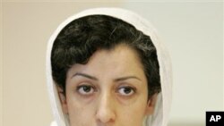 Iranian Narges Mohammadi, delegate of the Center for Human Rights Defenders, listens to a question during a press conference on the Assessment of the Human Rights Situation in Iran, at the UN headquarters in Geneva, Switzerland, Monday, June 9, 2008. (AP 