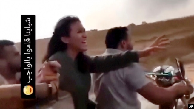 FILE - In this image from video, Noa Argamani reacts as she is seized by members of the Hamas militant group during an incursion into Israel on Oct. 7, 2023. Israel reported on June 8, 2024, that Aragamani was among four hostages rescued alive.