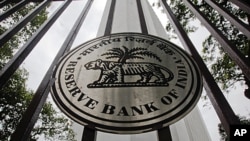 The Reserve Bank of India logo is pictured outside its head office in Mumbai, July 26, 2011.