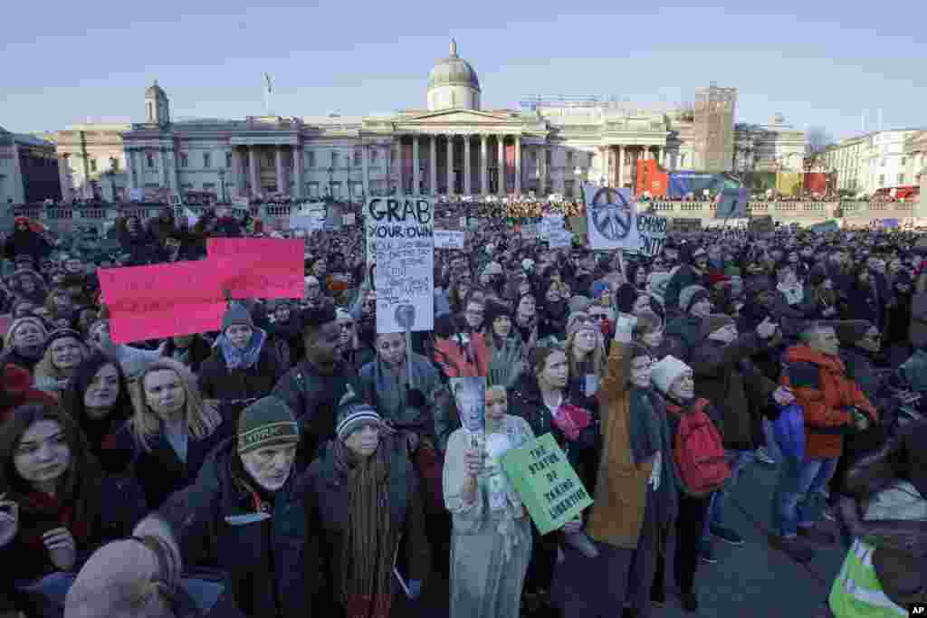 Demonstrators take part in the Women&#39;s March in Trafalgar Square, central London following the Inauguration of U.S. President Donald Trump in London, Saturday Jan. 21, 2016. The march is being held in solidarity with the Women&#39;s March in Washington, and other cities worldwide, advocating women&#39;s rights and opposing Donald Trump&#39;s U.S. presidency. National Gallery in background. (AP Photo/Tim Ireland)