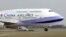 FILE - A China Airlines Boeing 747-400 sits on the tarmac at the Chiang Kai-shek International Airport in Taoyuan, Taiwan.