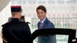 Canadian Prime Minister Justin Trudeau arrives at the G-7 summit in Biarritz, France, Aug. 25, 2019. 
