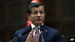 Turkish Prime Minister Ahmet Davutoglu addresses lawmakers in Ankara, Jan. 26, 2016. He has reiterated Turkey's opposition to including Syrian Kurdish forces at the Geneva talks.