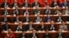 Delegates applaud during the opening ceremony of the Chinese People's Political Consultative Conference at the Great Hall of the People in Beijing on March 4, 2025. 