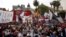 Demonstrators gather during a protest against economic policies implemented by Argentina's President Mauricio Macri in Buenos Aires, Argentina, Dec. 22, 2015. 