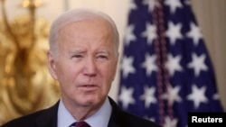 FILE -U.S. President Joe Biden holds an event about American retirement economics in the State Dining Room at the White House in Washington, U.S., October 31, 2023.