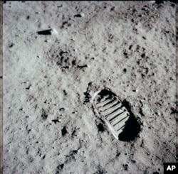 FILE - Apollo 11 astronaut Edwin "Buzz" Aldrin photographed this footprint in the lunar soil on July 21, 1969 as part of an experiment to study the nature of lunar dust and the effects of pressure on the surface. (Edwin "Buzz" Aldrin/NASA via AP)