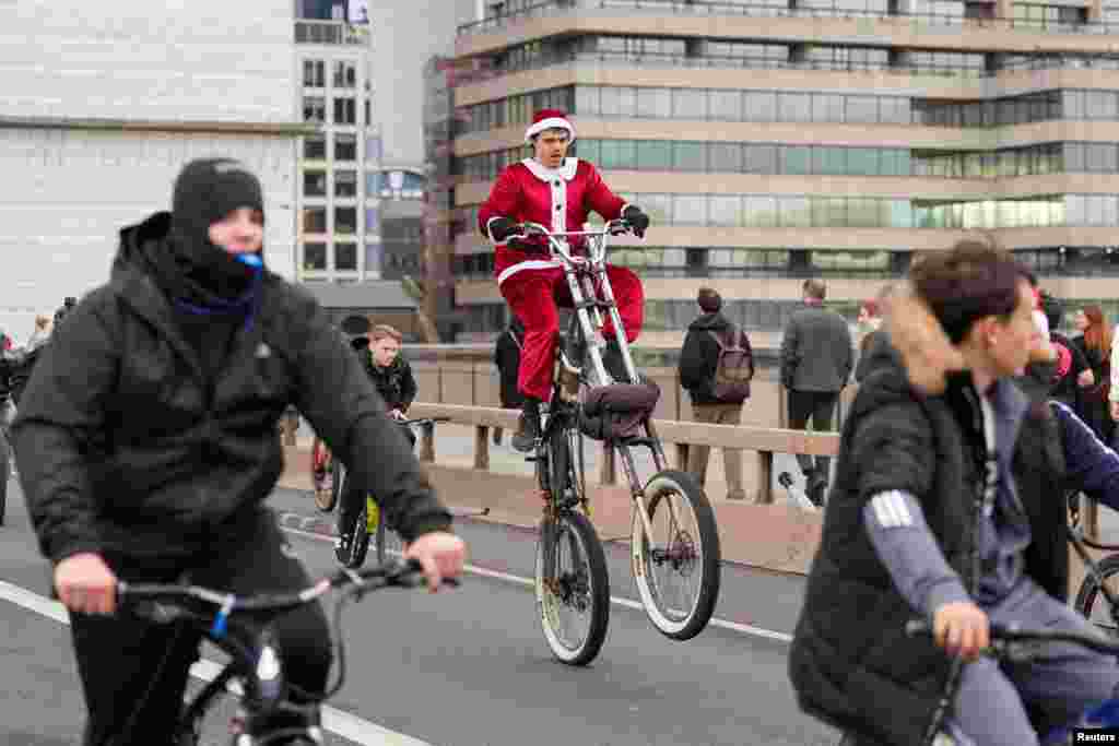 BikeStormz community ride out against knife crime, crossing London Bridge, in London.